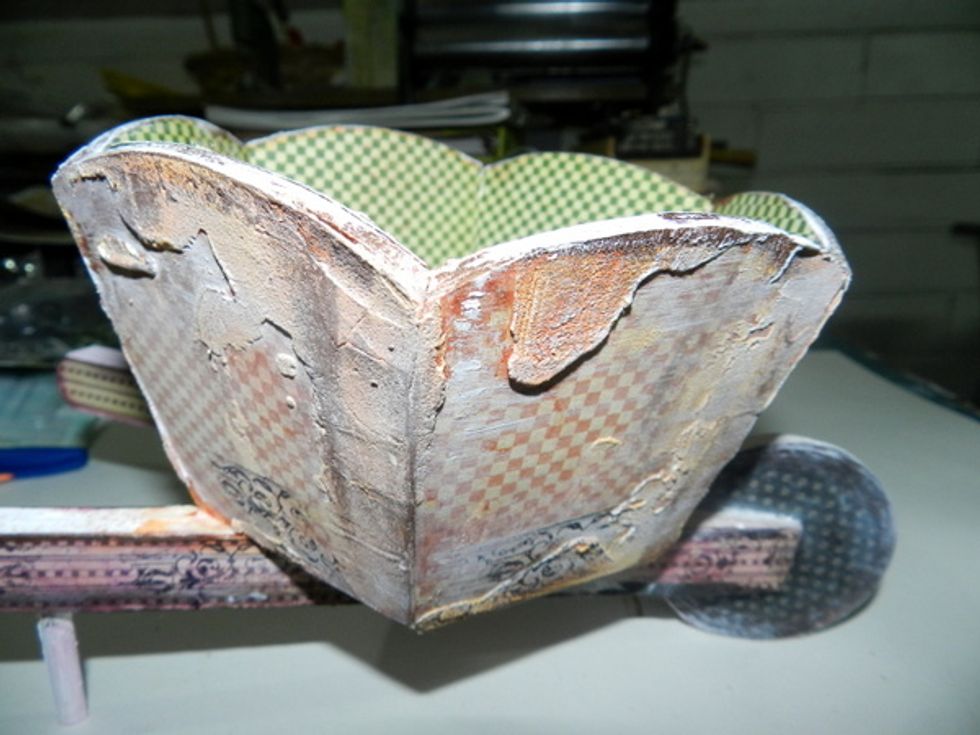 Apply a thin layer of acrylic gesso and remove the excess with baby wipes.