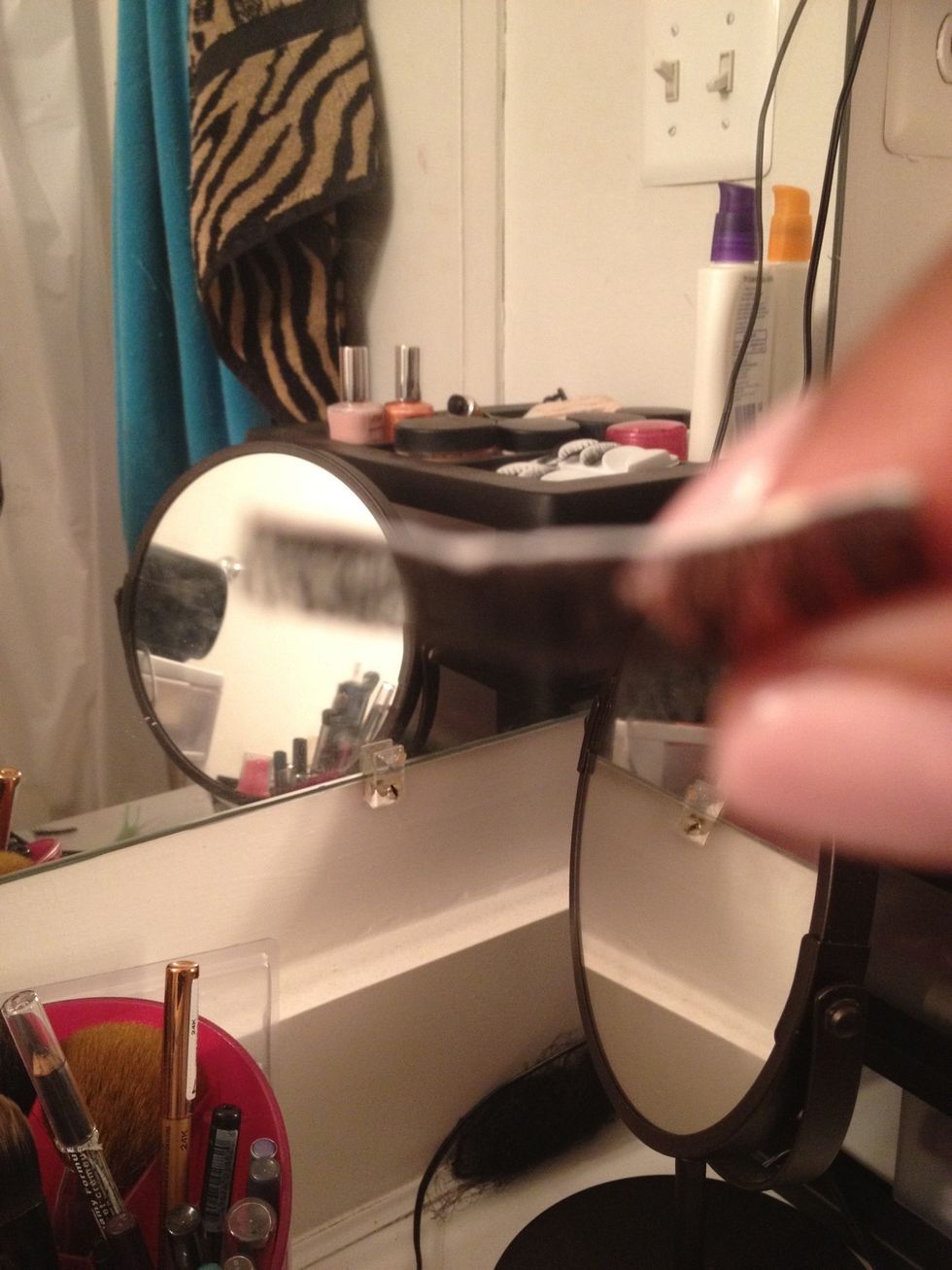 Apply a thin layer of DUO Adhesive glue onto the lashes of your choice