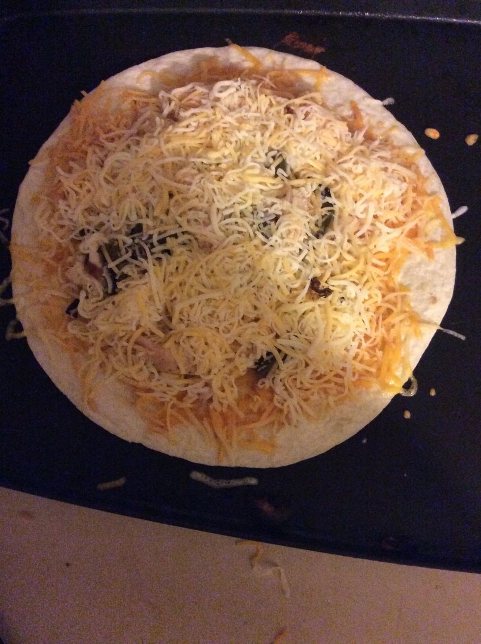 Apply a top layer of cheese