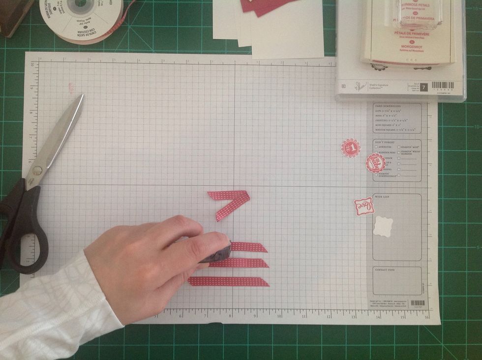 Apply adhesive to the center of the ribbon.