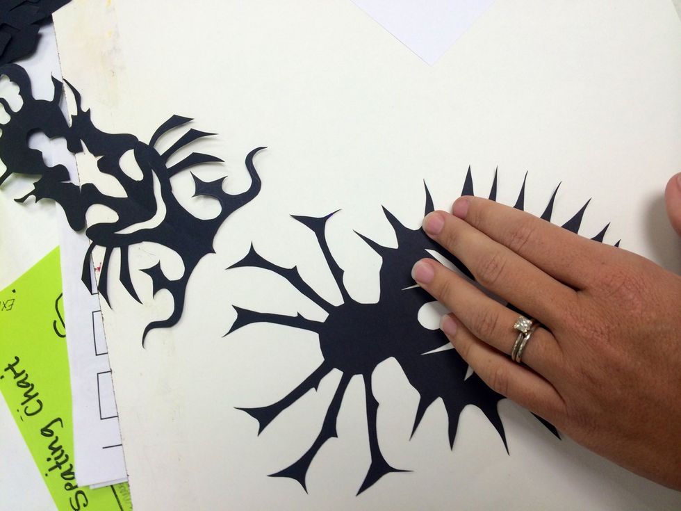 Apply black insect shape to white paper.