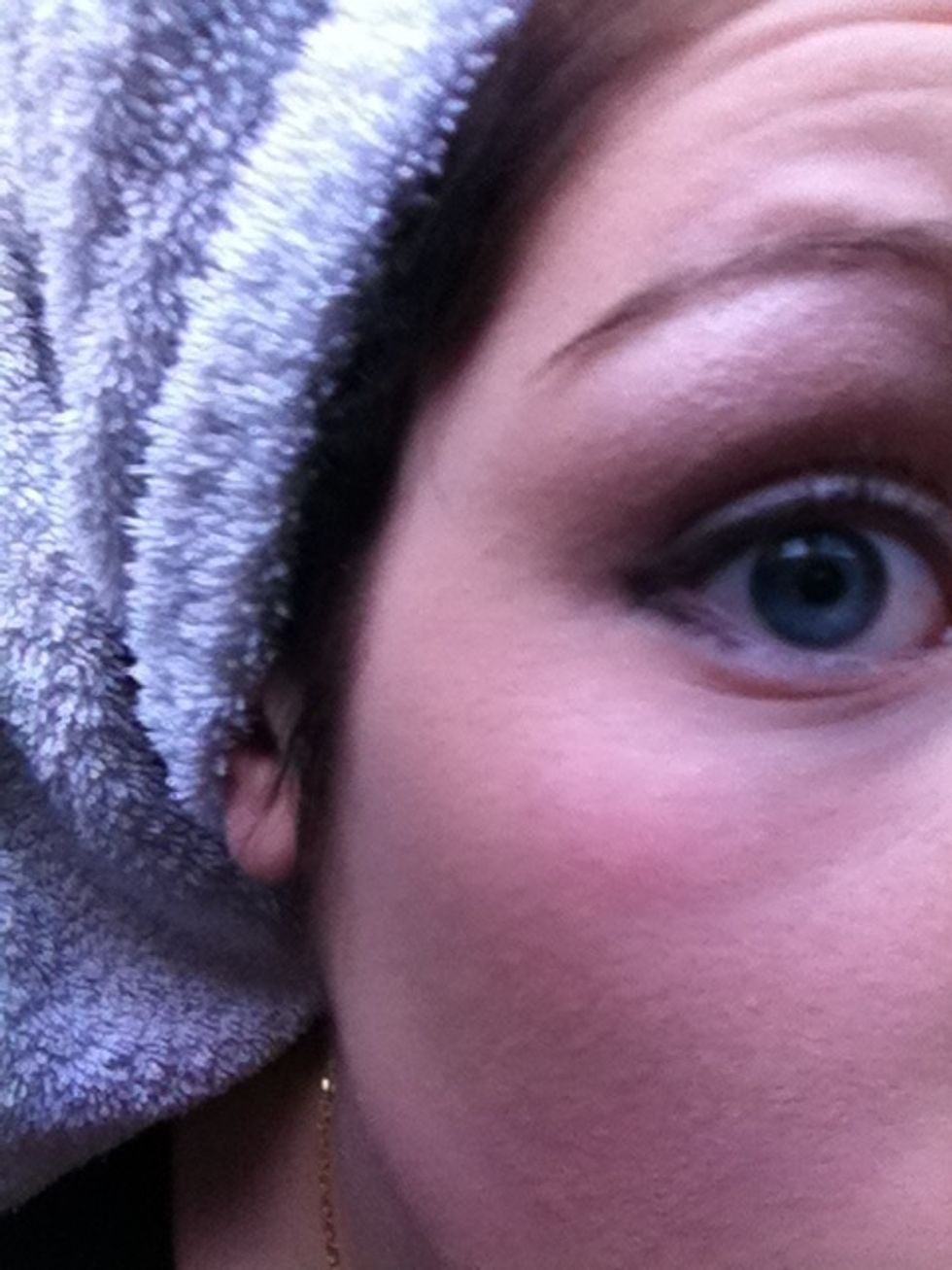 Apply black pencil eyeliner around corners of eyes as modelled above