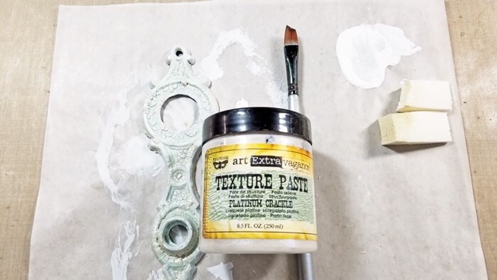 Apply Crackle Texture Paste to vintage finding.