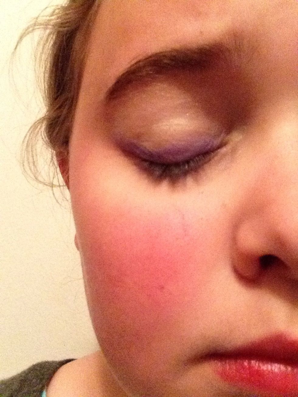 Apply dark matte eyeshadow to your eyelid above your lashes