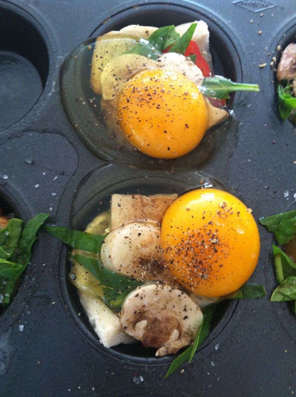 Apply egg on top layer. Season with salt and pepper.