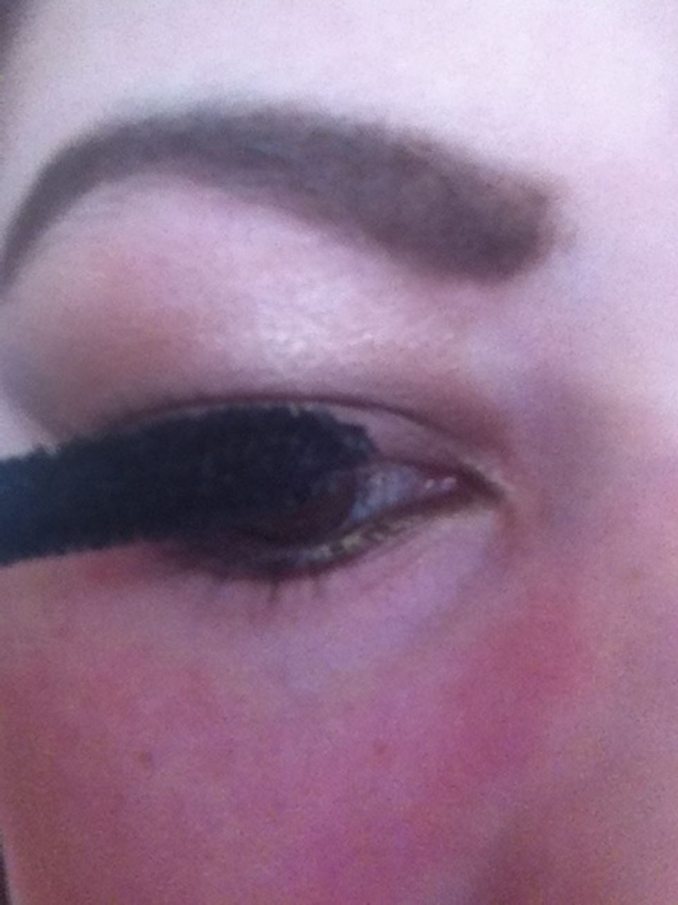 Apply either mascara or fake eyelashes depending on how natural you want the look the be.