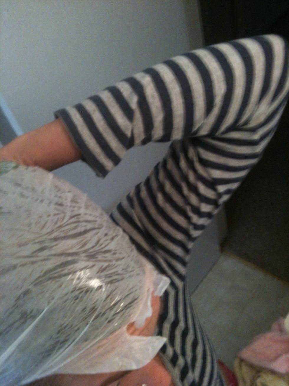 apply entire amount to head, comb through with a wide tooth comb and wrap in a shower cap, or like me, just use one of those hundreds of free plastic grocery bags you have around :)