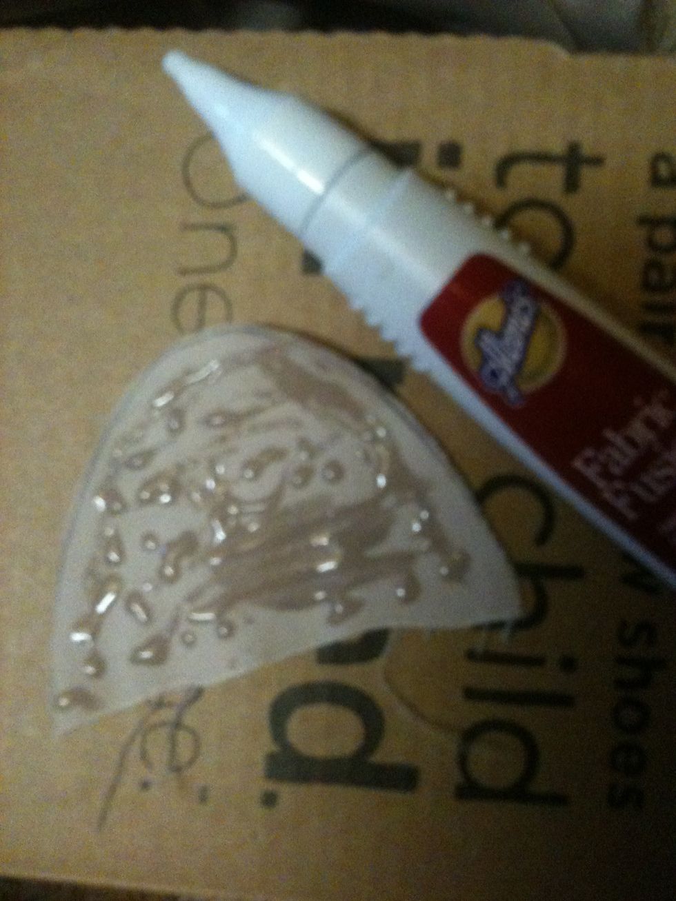 Apply fabric glue to the top of your cut out (follow packaging directions).