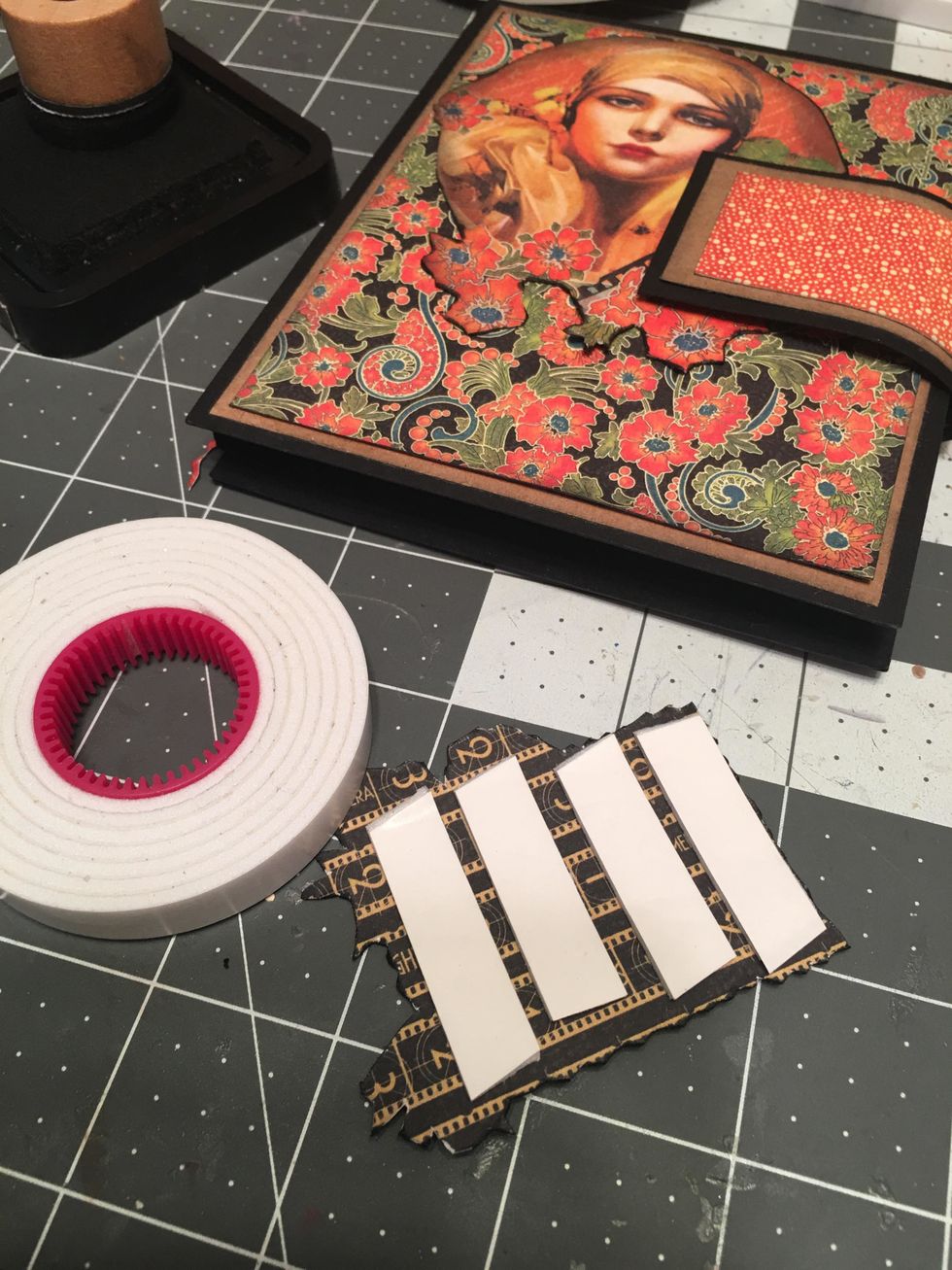 Apply foam tape to the back of the cut out stamp image.