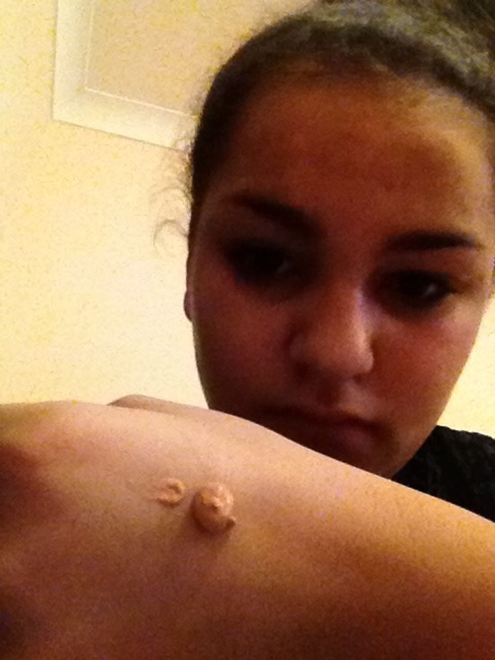 Apply foundation to the back of your hand use a foundation brush and apply all over the face stroke in all the same direction.