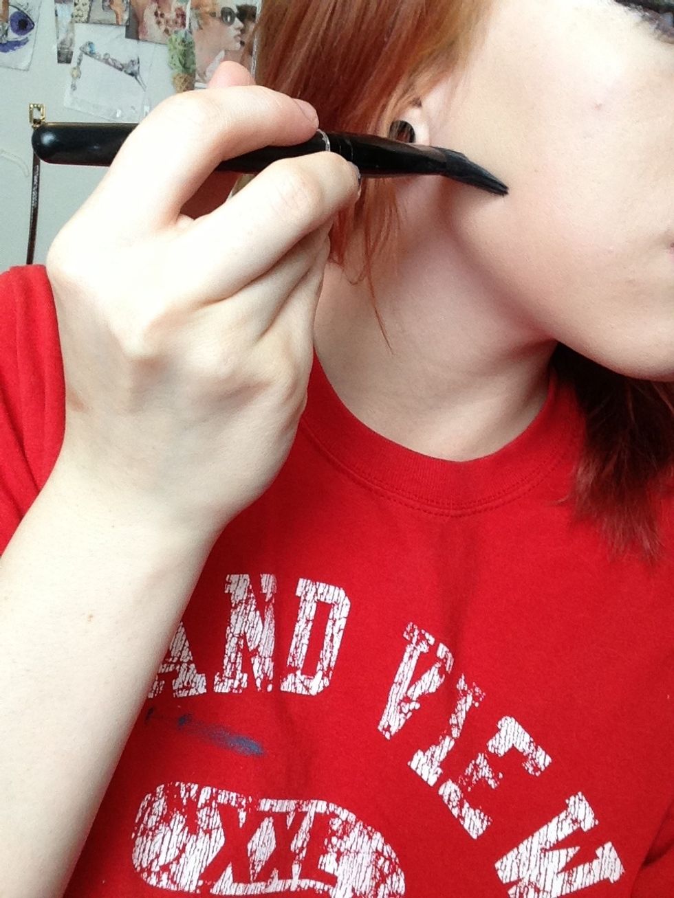 Apply foundation (with a brush!!) from your jawline, upwards.