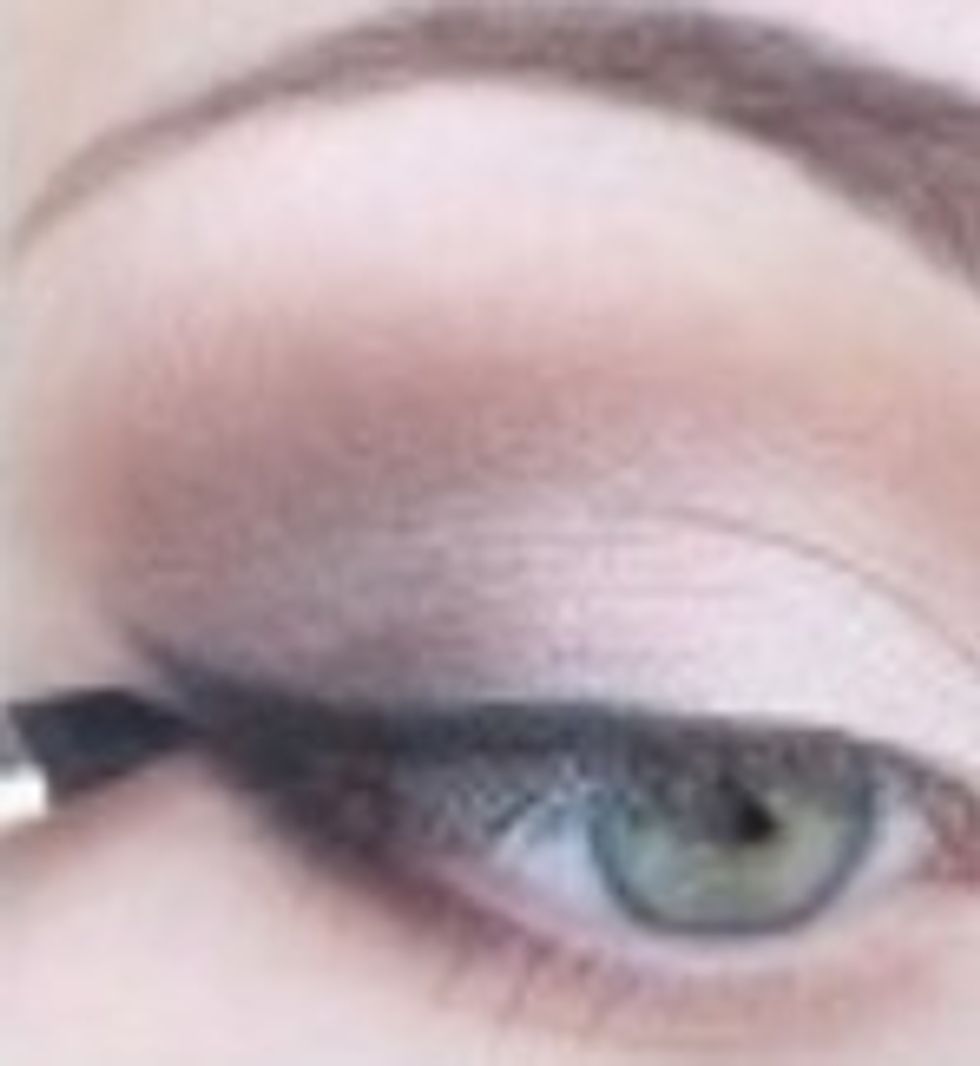 Apply gel eye liner around the tip of your eye to the back. Also use a very thin amount on the bottom of your eye. Then create the winged look. (winged is optional. Looks great with or without!)
