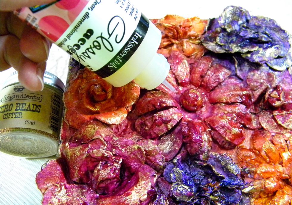 Apply Glossy Accents to some of the flower centers and randomly to the petals.