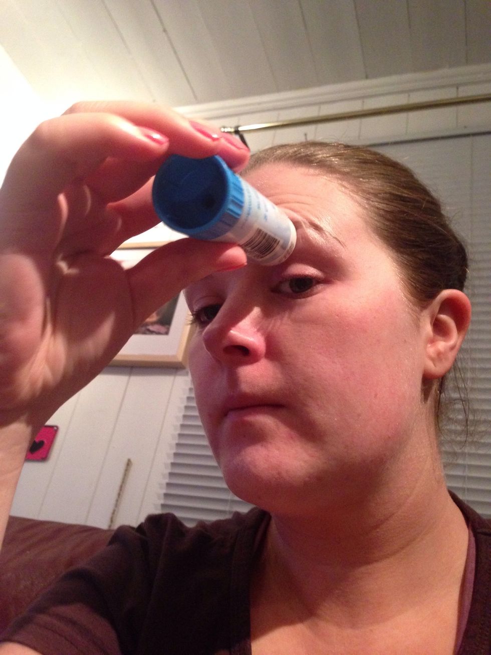 Apply glue (normal school glue) to your eyebrows to keep them from getting stuck to the latex. This is if you use latex instead of spirit gum.  Wait for the glue to dry.