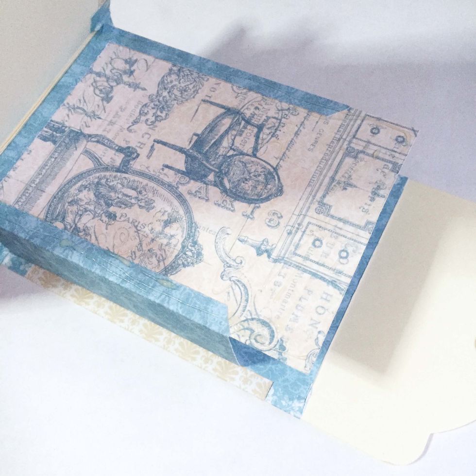 Apply glue on one side and glue down onto one side of the tags. Adjust when necessary.