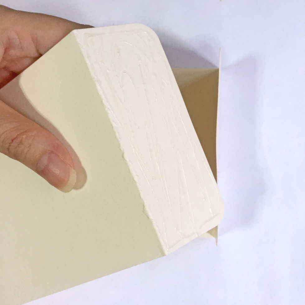 Apply glue on one surface.