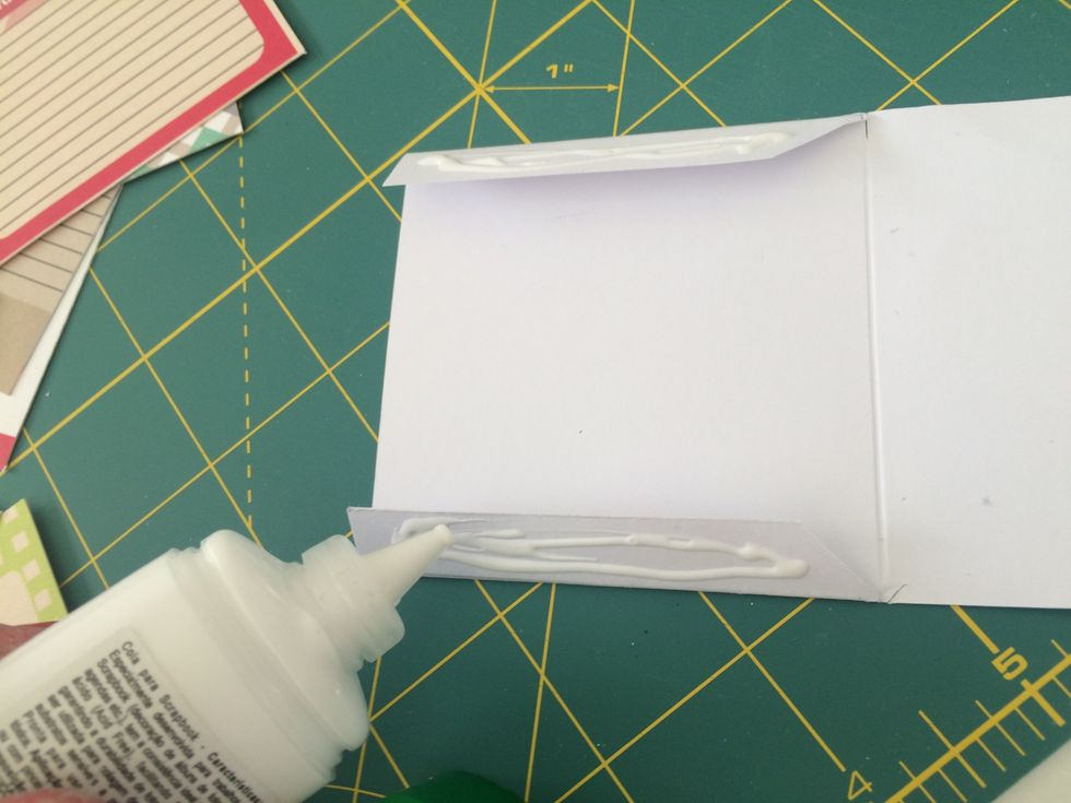 Apply glue on the tabs.