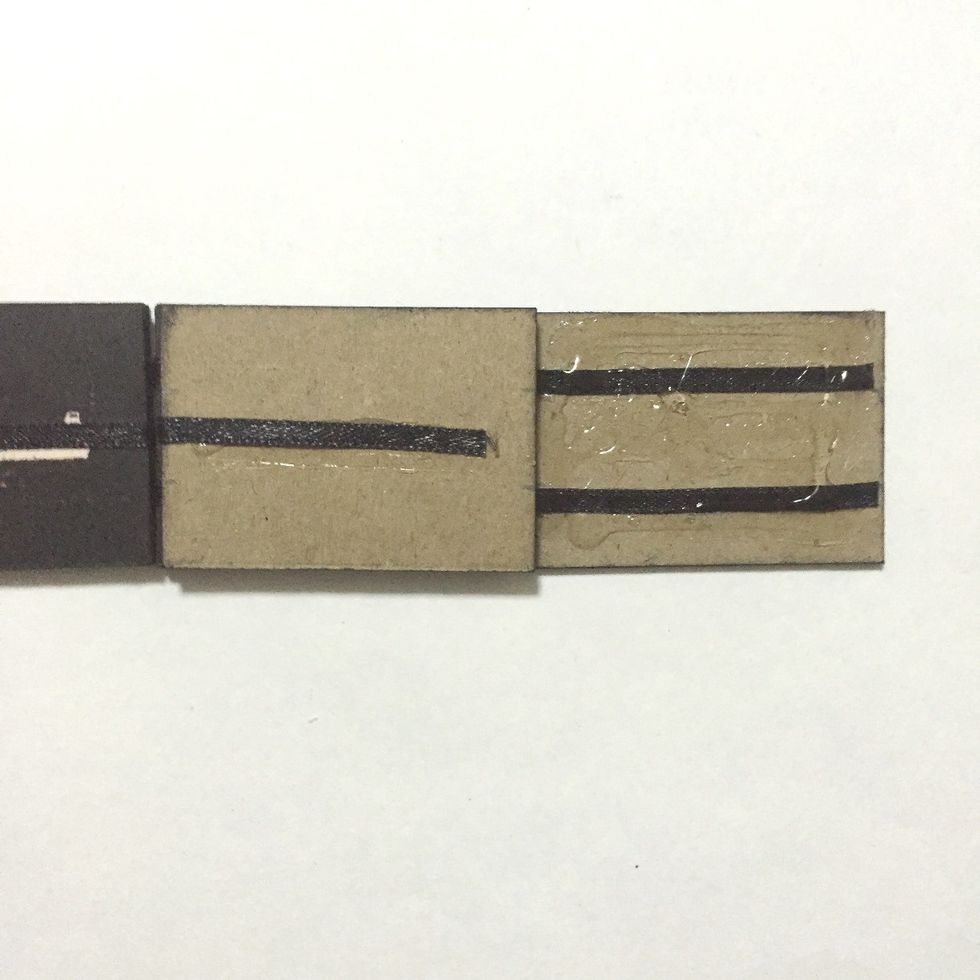 Apply glue onto the 11th number block as shown..