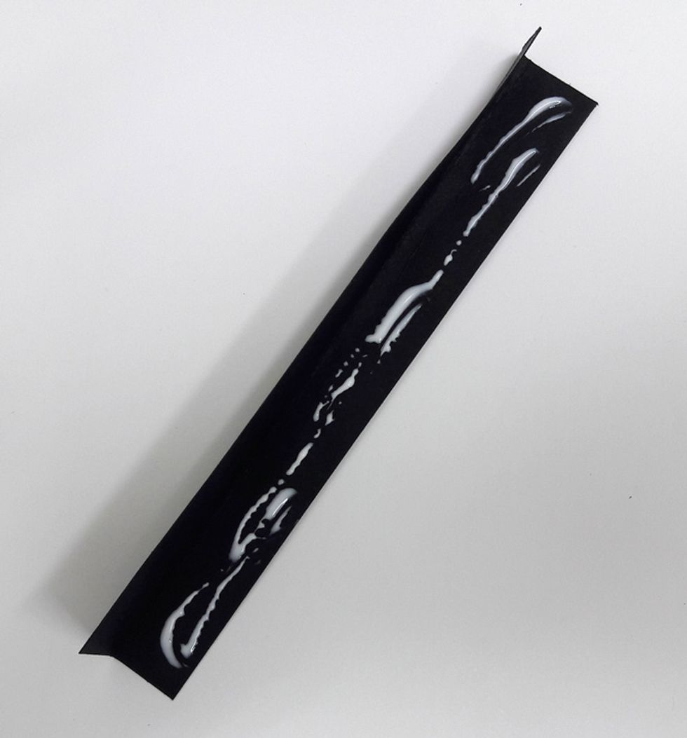 Apply glue to inside of strip and glue sides together.