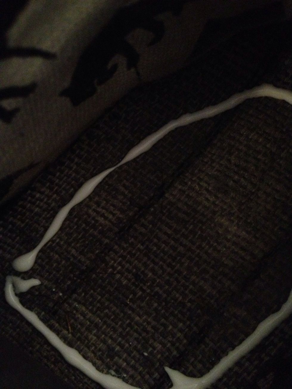 Apply glue to the base of the shoe.