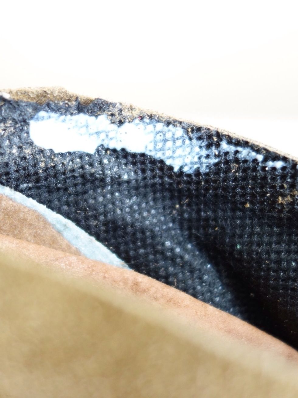 Apply glue to the inside of the fabric and fold down.