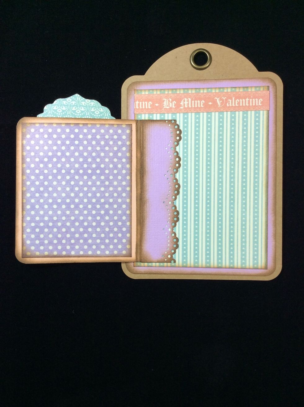 Apply glue to the three straight edges. Do not glue the punched edge. Adhere in to position covering  the 1/4 inch section on the hinge cover.