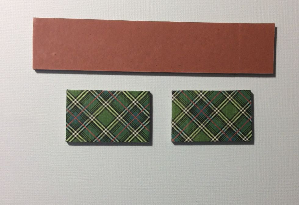 Apply high tack tape to both sides of all chip board pieces and cover with chosen patterned paper. Good ol sport big score used here