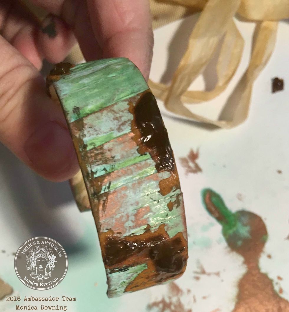 Apply Iron VerDay paint in random areas, applying it thickly to add texture. Now let this cure.