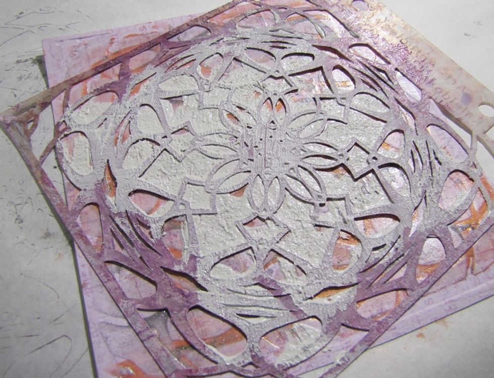 Apply it throught the stencil, but don't need to be perfect. Just add some more bright texture.