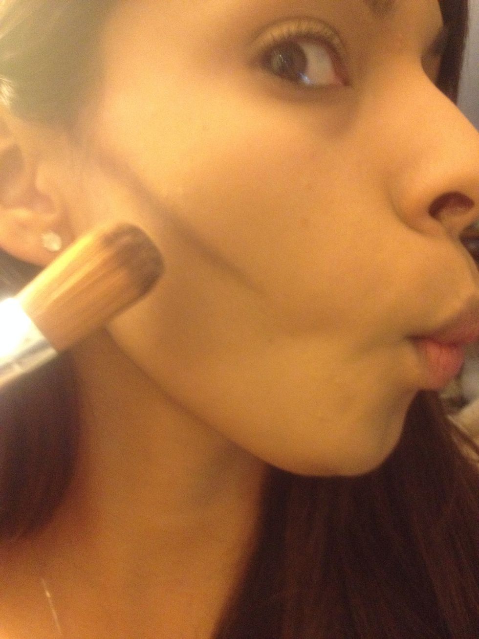 Apply it to hollows of the cheek. Find it by making a fishy face. I don't go further than half the cheek.