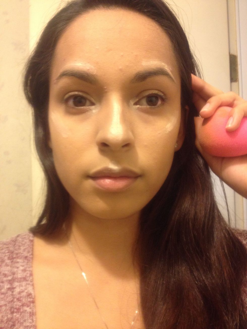 Apply it to the highest points of the cheek bones, bridge of the nose, above the eyebrows, and your Cupid's bow above your lip.