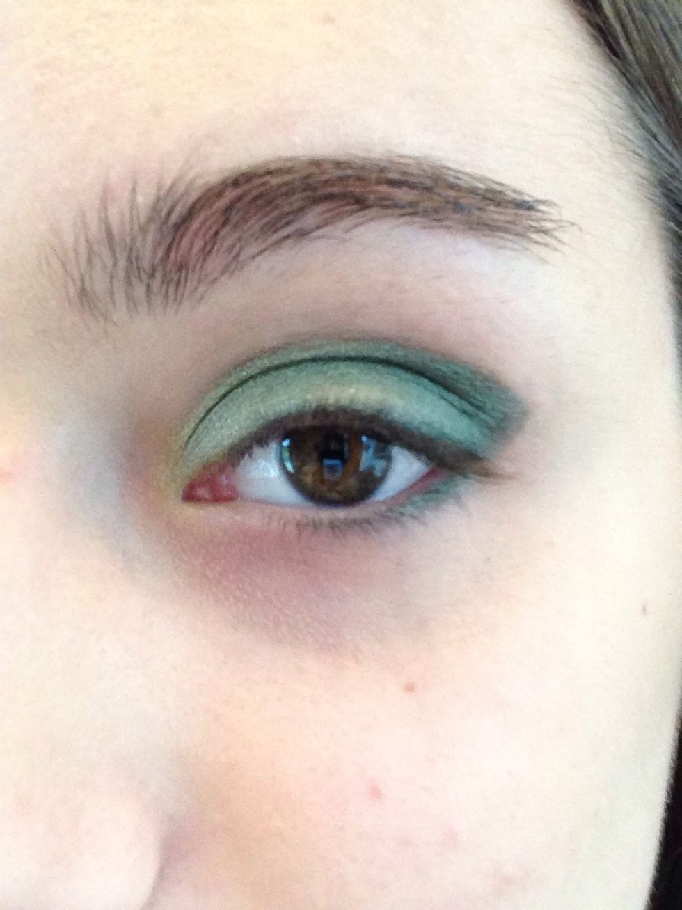 Apply just a little bit of back eyeshadow one your upper lash line