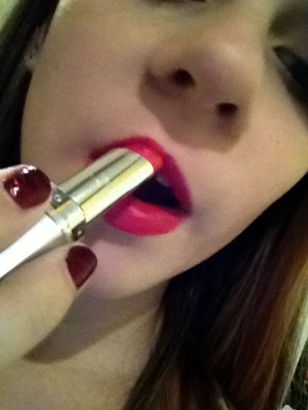 apply lip stick all over.