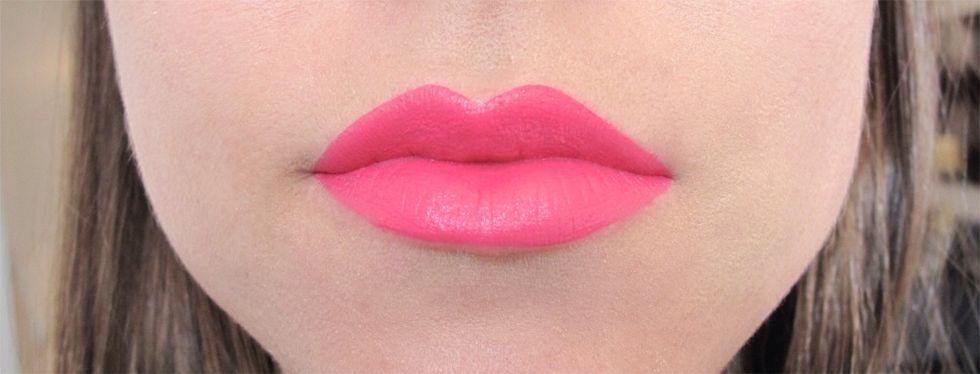 Apply lipstick as a base to clean, moisturized lips.