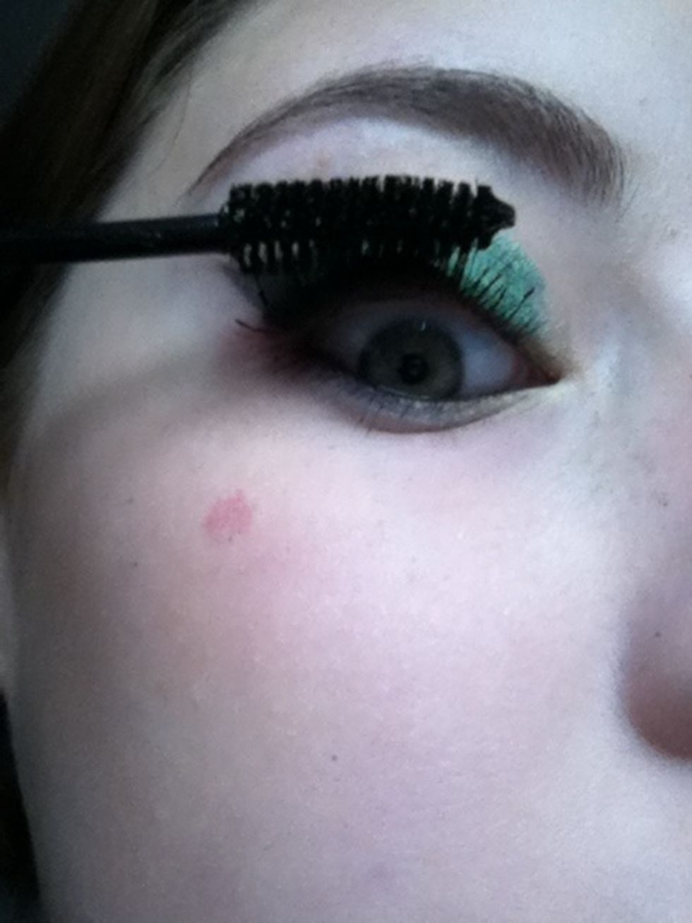 Apply mascara to both top and bottom lashes.