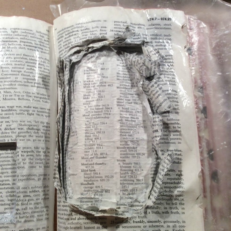 Apply Mod Podge over your pages. Make sure to get in all the little folds. I placed a sheet of wax paper between the niche pages and the page I will be placing the photo as to seperate them.