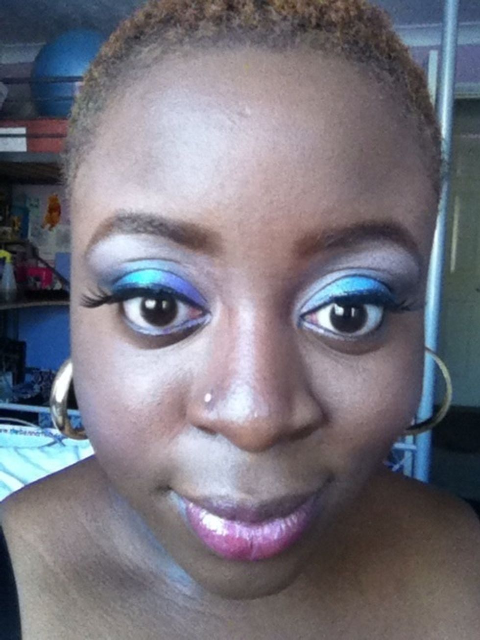 Apply neutral blush and neutral gloss. Bright eyes are enough