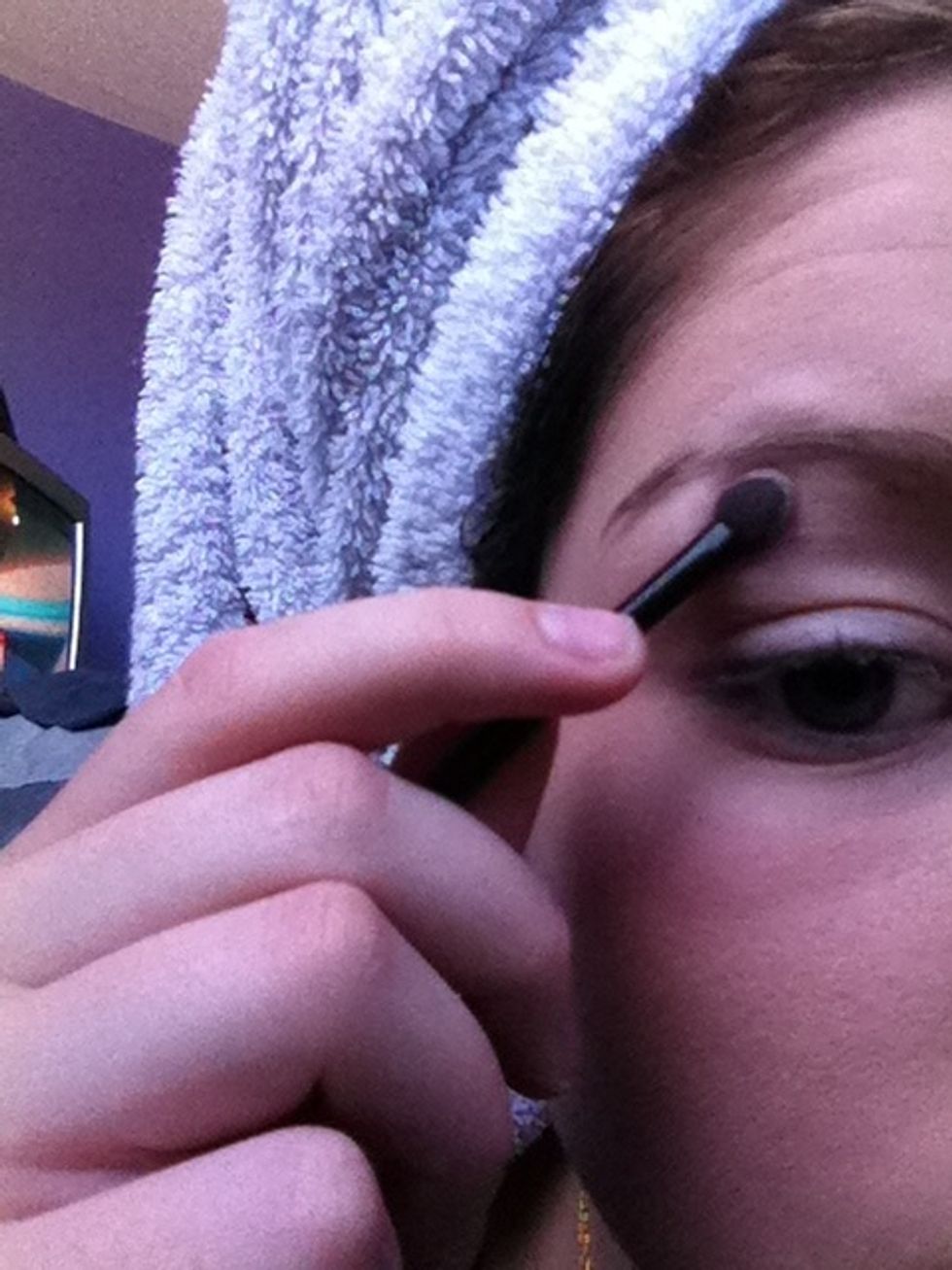 Apply pale eyeshadow all over the lid including under the eyebrow