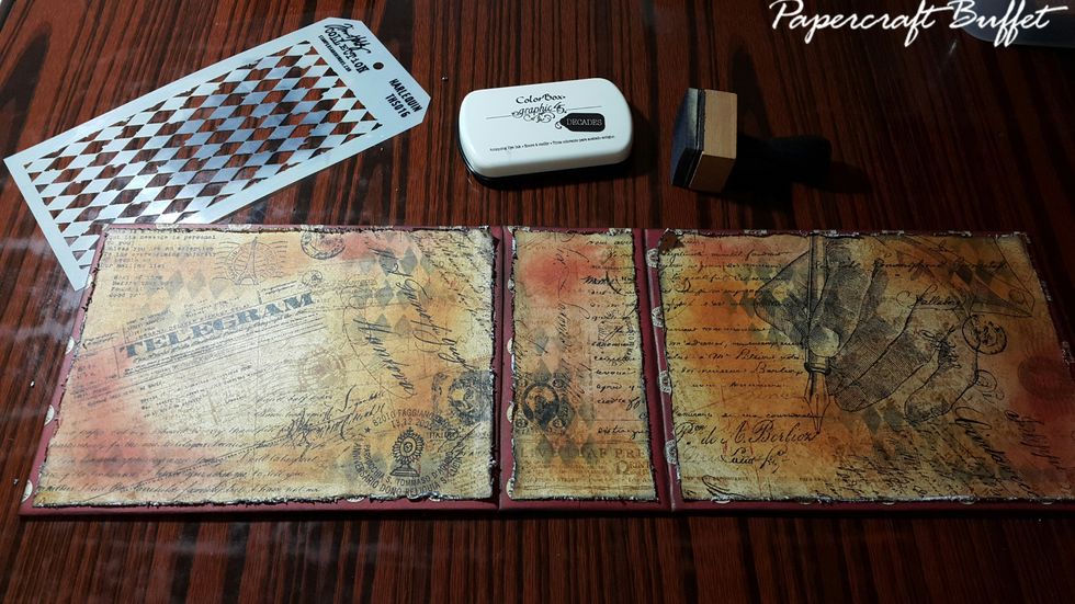 Apply pattern on the cover randomly with stencils and ink.