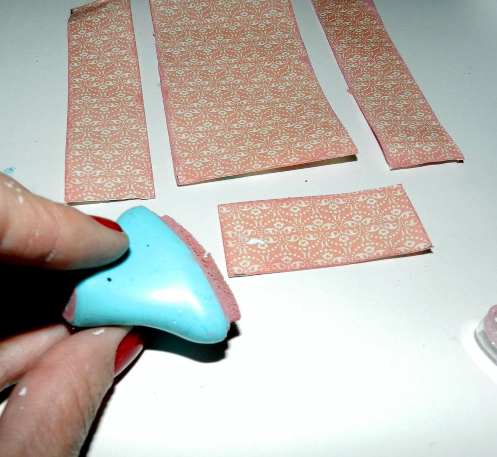 Apply pink ink pad on the borders of papers.