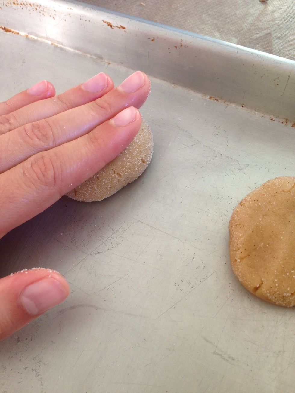 Apply pressure to so the height is the cookie is about half an inch Side note: I like when the dough crack along the edges