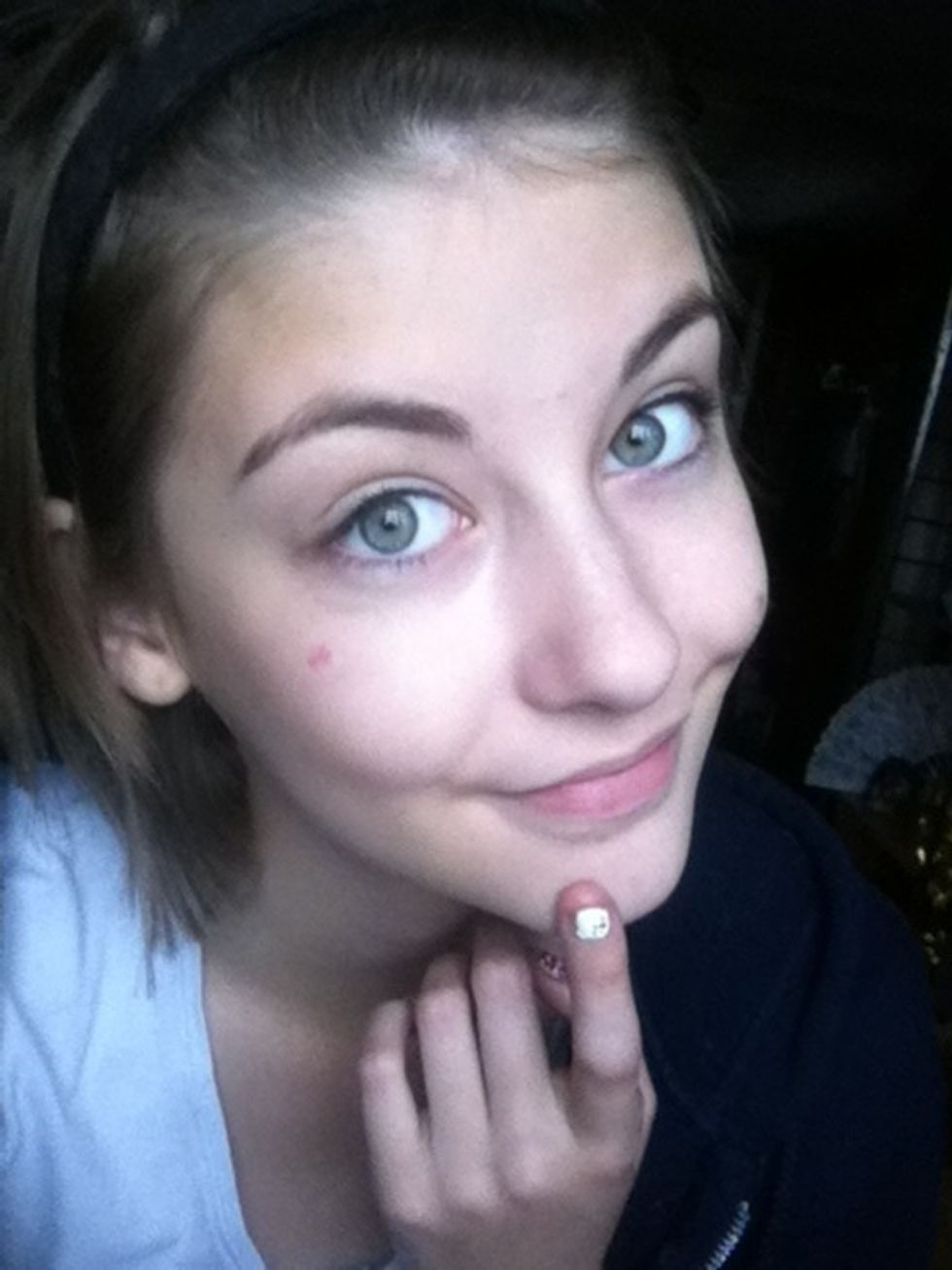 Apply primer, foundation and concealor. (my finger is covering a nasty spot) :P