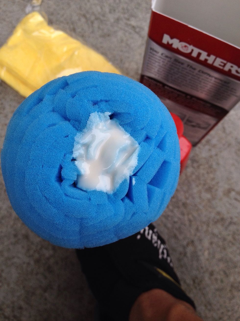 Apply quarter size application of Mothers restoration solution onto powerball. Set your drill to its lowest speed and begin to polish the headlight. Reapply solution as needed.