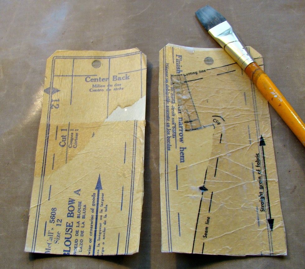 Apply random pieces of dress pattern to your tag using Mod Podge... allow to dry completely.