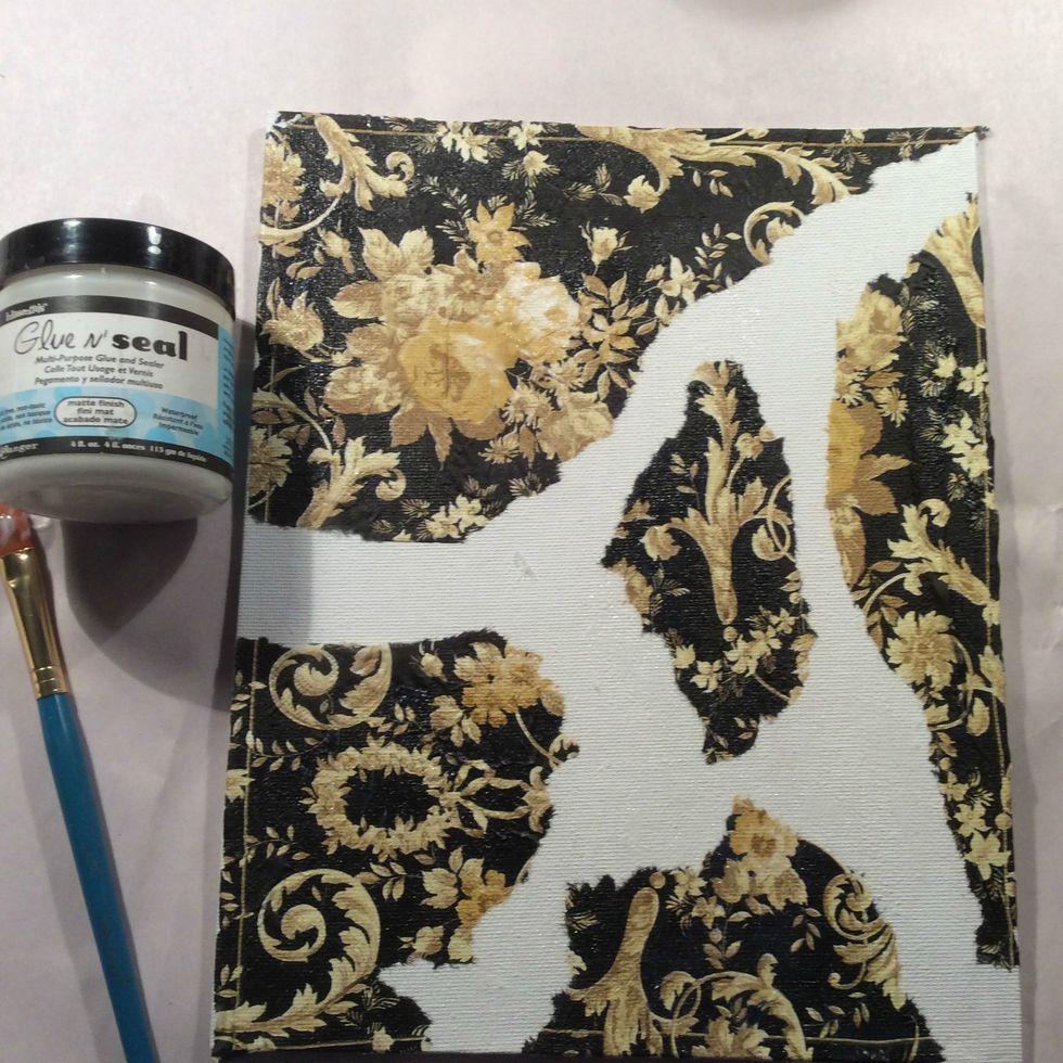 Apply randomly to your canvas with preferred adhesive. I used homemade Mod Podge... 1/2 School Glue + 1/2 water.