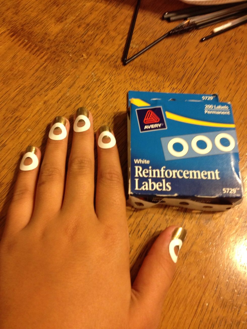 Apply reinforcement labels to cuticle.
