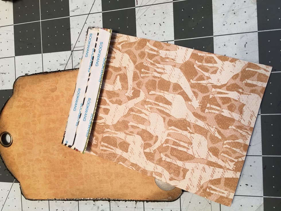 Apply Scor-tape to the flap on the back side only.