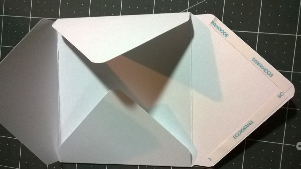 apply score tape to the bottom of your envelope being careful not to put adhesive where it will prevent the card from slipping inside.