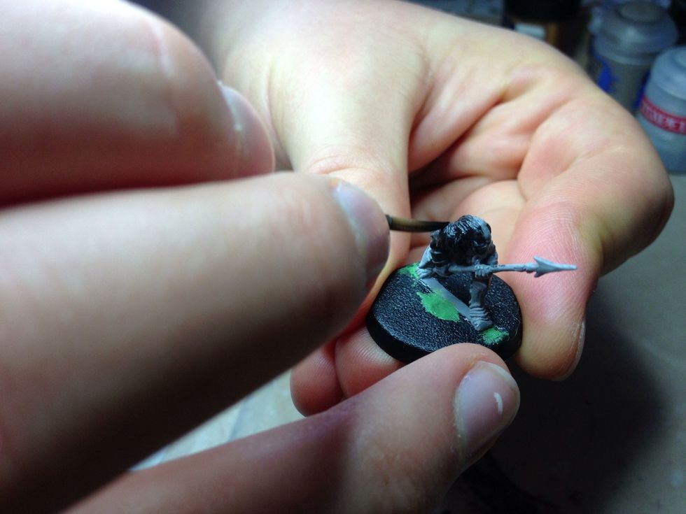 Apply several thin coats to the model until it is a solid black.