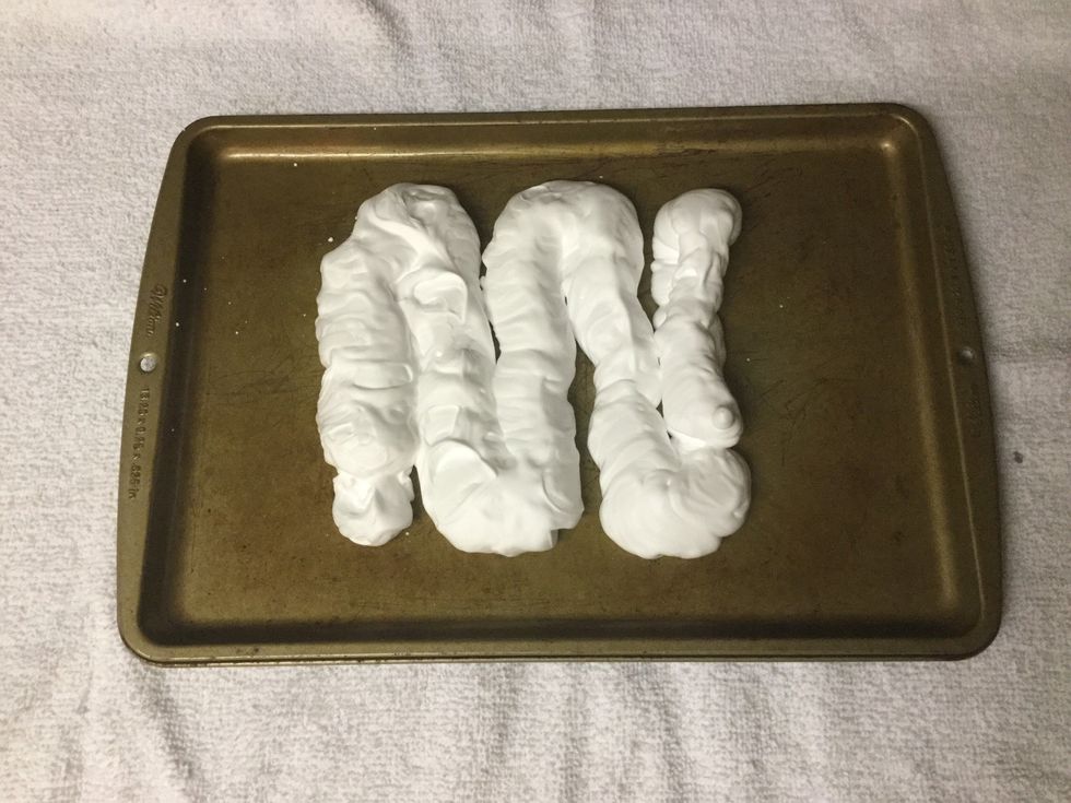 Apply shaving cream to a flat surface.